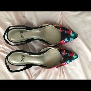 Colorful kitten heel sling back pumps.